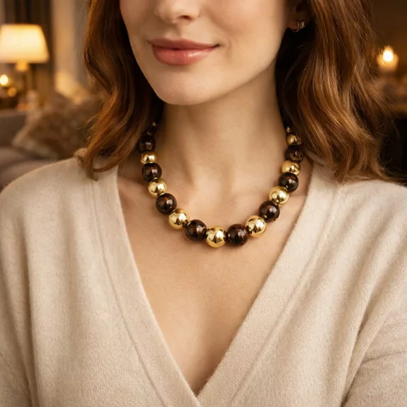 Collier boules dorées et...