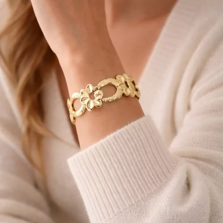 Bracelet jonc doré fleurs et anneaux acier