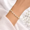 Bracelet fleurs strass colorés – Acier inoxydable doré
