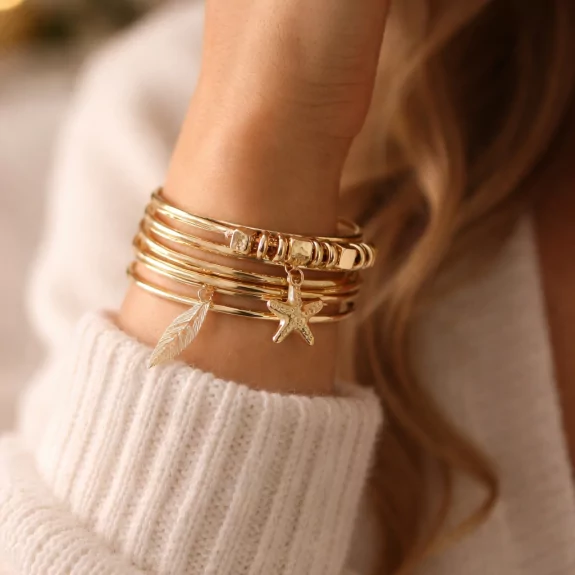 Bracelets multi joncs dorés...