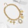 Collier doré breloques baroques