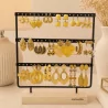 Pack de 18 boucles d'oreilles acier - JAUNE