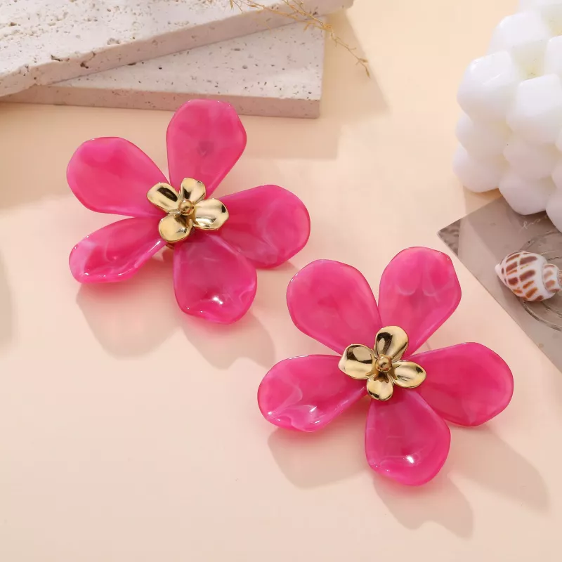 Grosses boucles d’oreilles fleur en résine et acier doré