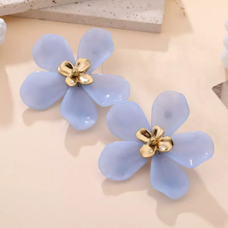 Grosses boucles d’oreilles fleur en résine et acier doré