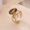 Bague ajustable en acier doré et cristaux