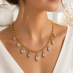 Collier doré breloques cristal