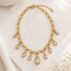 Collier doré breloques cristal