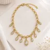 Collier doré breloques cristal