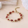 Bracelet acier doré et cristaux