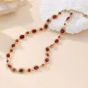 Collier acier doré et cristaux
