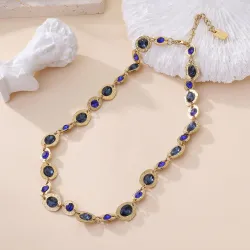 Collier acier doré et cristaux