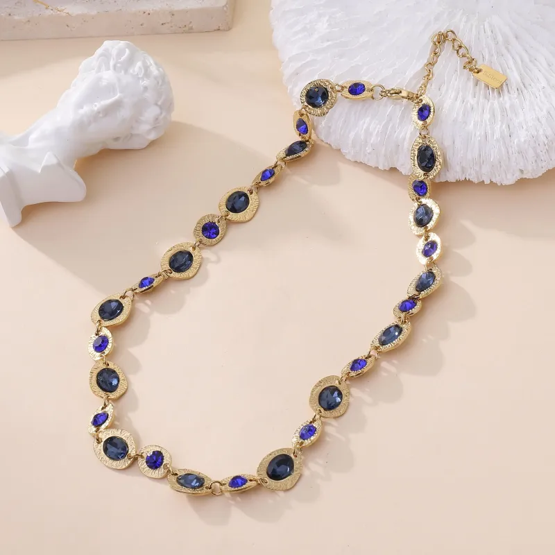 Collier acier doré et cristaux