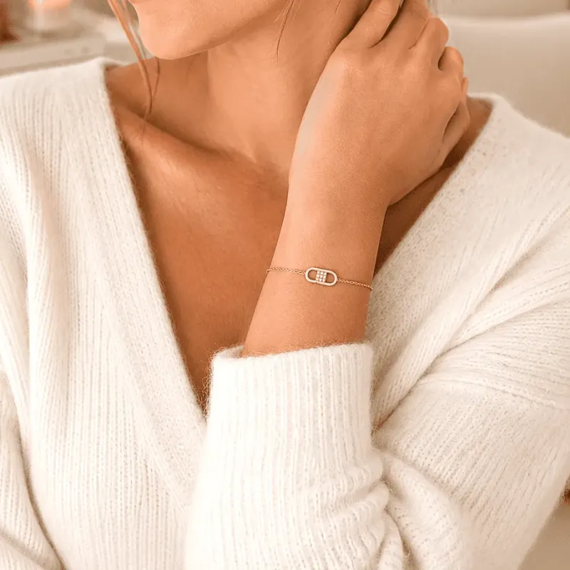 Bracelet doré pendentif capsule minimaliste