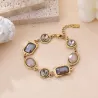 Bracelet acier inoxydable doré cabochons colorés femme