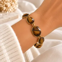 Bracelet doré à pierres ovales