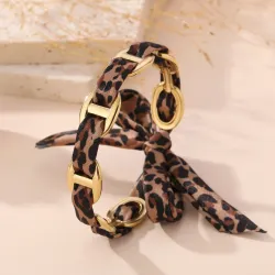 Lot de 10 bracelets dorés à rubans satinés et nœuds