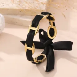 Lot de 10 bracelets dorés à rubans satinés et nœuds