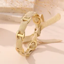 Lot de 10 bracelets dorés à rubans satinés et nœuds