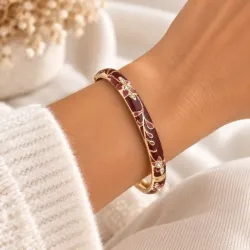 Bracelet jonc doré émaillé à motifs fleuris et strass