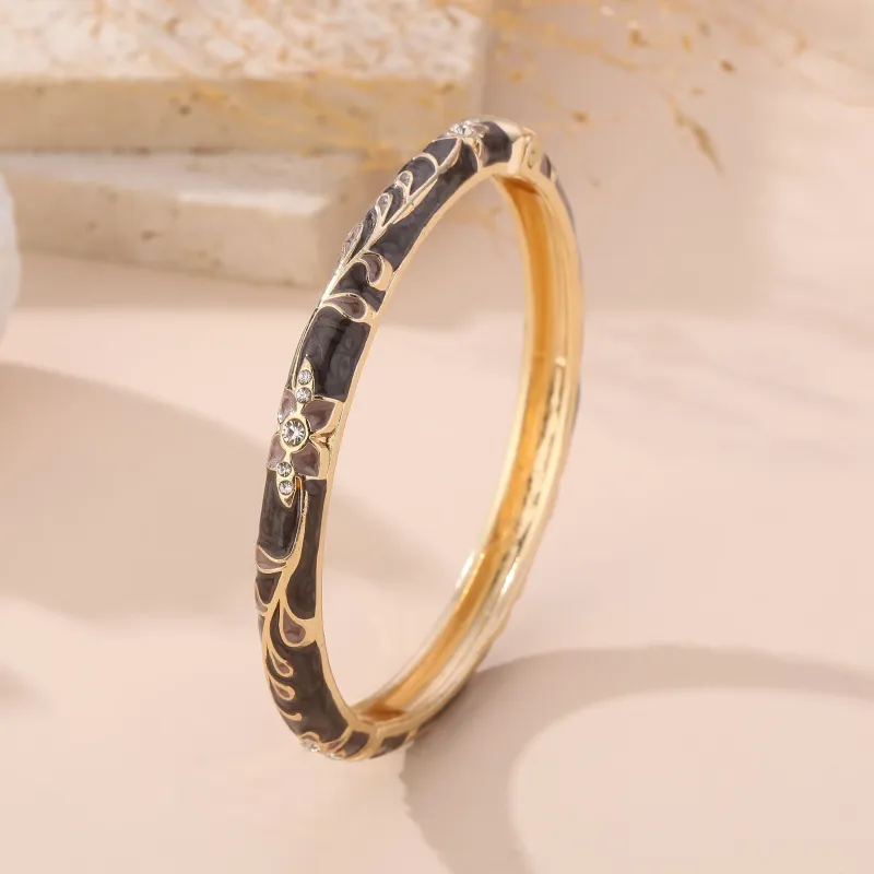 Bracelet jonc doré émaillé à motifs fleuris et strass