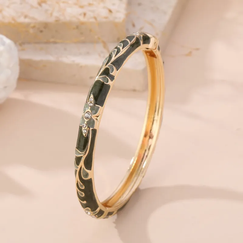 Bracelet jonc doré émaillé à motifs fleuris et strass