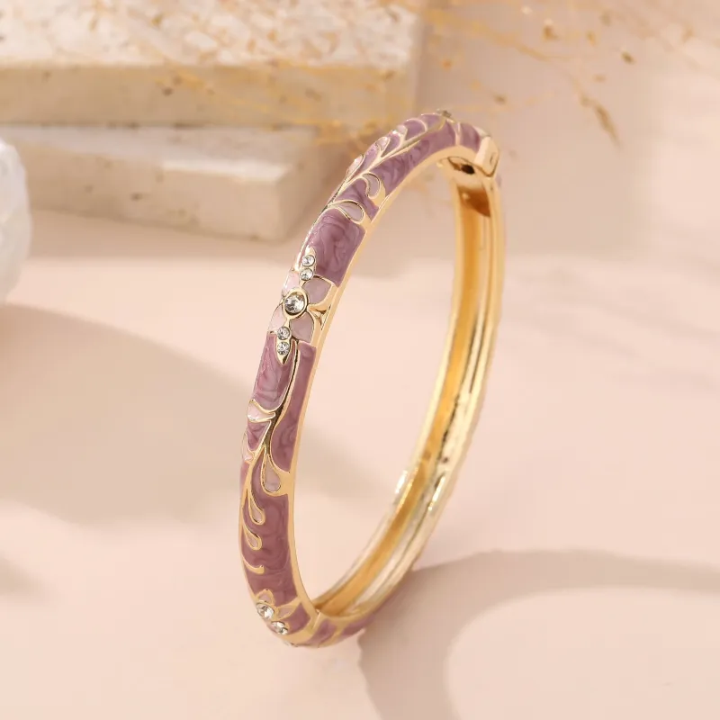 Bracelet jonc doré émaillé à motifs fleuris et strass