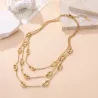 Collier doré multirangs à maillons luxe