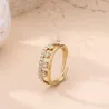 Bague dorée ajourée à strass