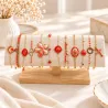 Pack de 12 bracelets acier - ROUGE